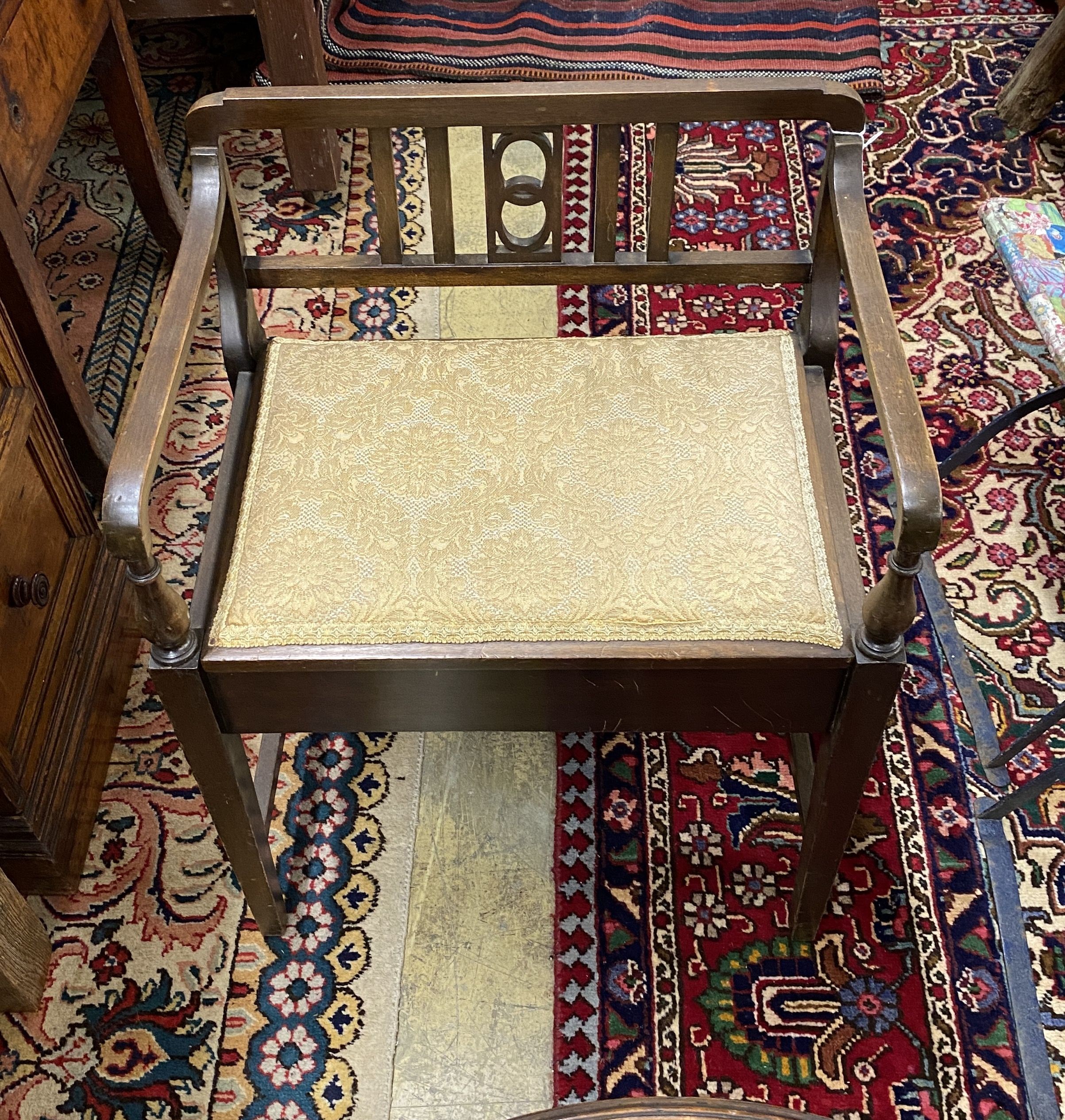 A Georgian mahogany circular tilt top tripod table with dished top, diameter 54cm, height 70cm together with an Edwardian piano stool